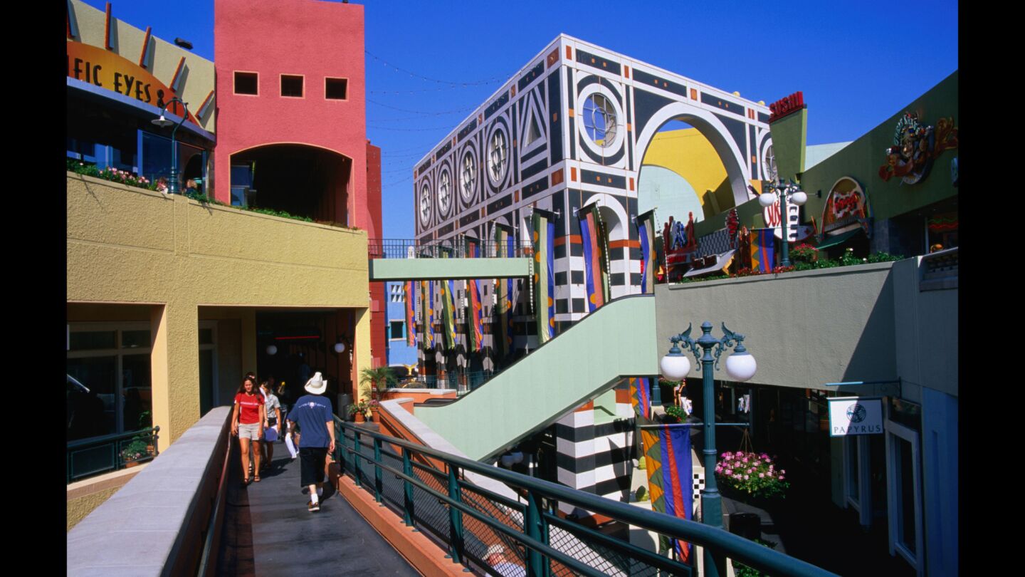 The Jon Jerde-designed Horton Plaza in San Diego, shown in 1985, with its post-modernist color scheme and split-level walkways, has been likened to an Escher drawing. The shopping center and entertainment complex is the centerpiece of downtown San Diego.