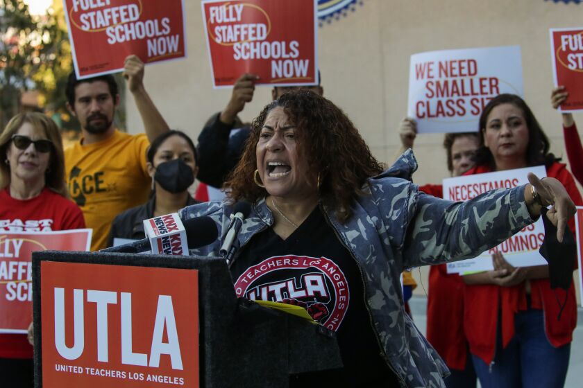 Los Angeles, CA - October 19: UTLA president Cecily Myart-Cruz addresses a rally of teachers, parents and community members protesting LAUSD's lack of urgency around core contract demands, staff shortages and vacancies, at a pre-school picketing at Bravo Medical Magnet High School on Wednesday, Oct. 19, 2022 in Los Angeles, CA. (Irfan Khan / Los Angeles Times)