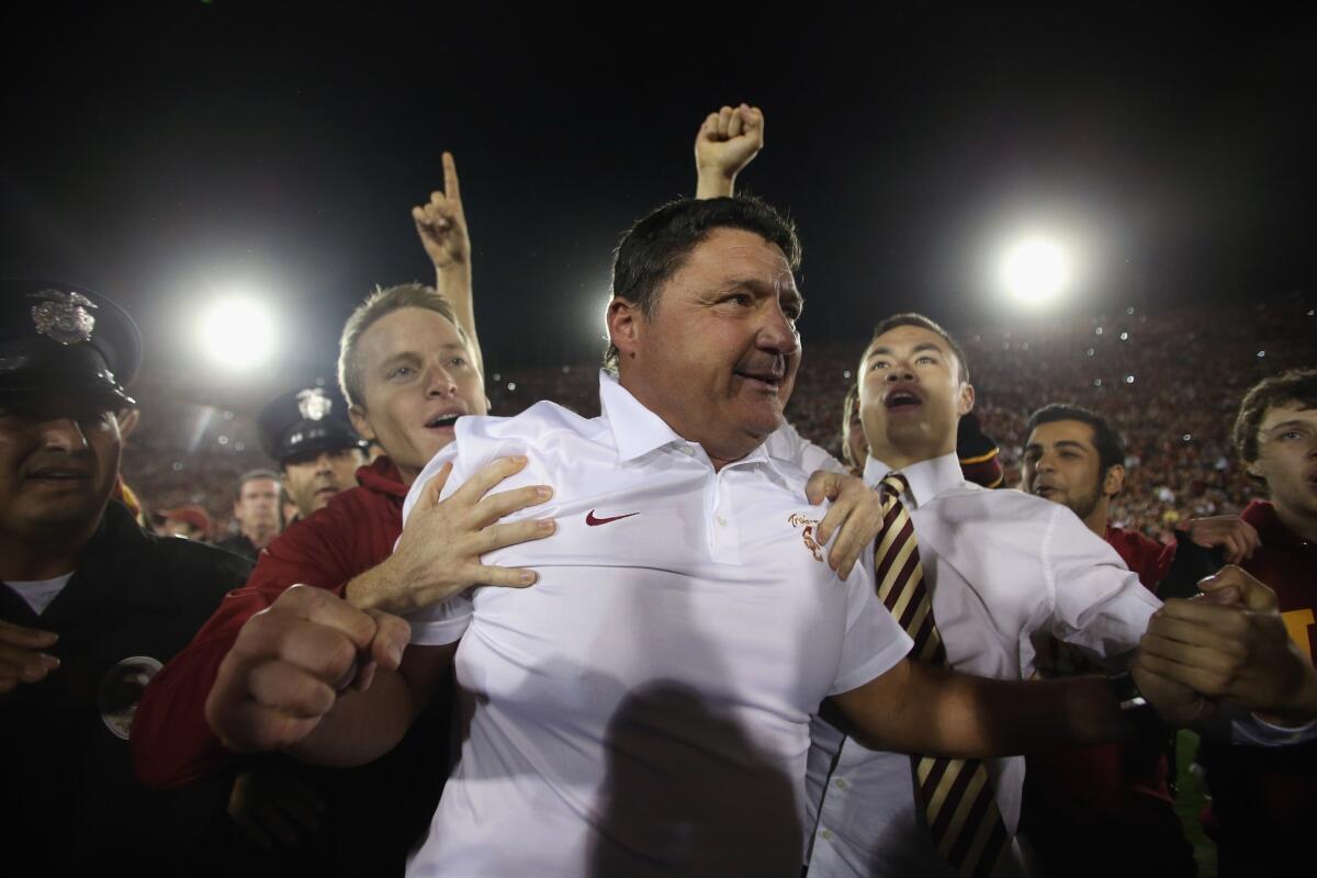Ed Orgeron led USC to a 6-2 record during his time as interim coach with his loses only to Notre Dame and UCLA in 2013.