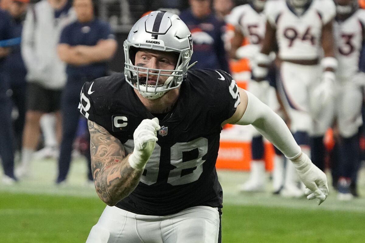 Las Vegas Raiders defensive end Maxx Crosby (98) plays against the Denver Broncos on Dec. 26, 2021.