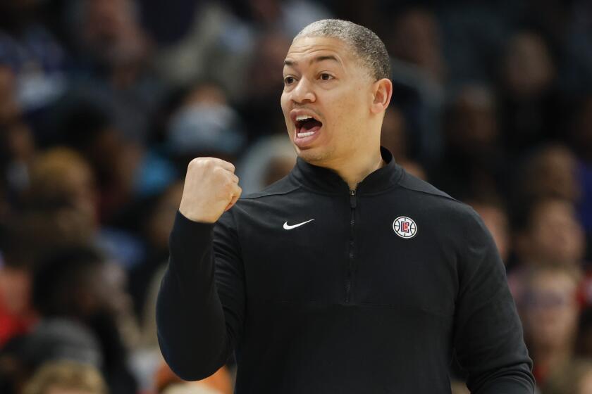 Los Angeles Clippers head coach Tyronn Lue argues a call during the second half of an NBA basketball game.