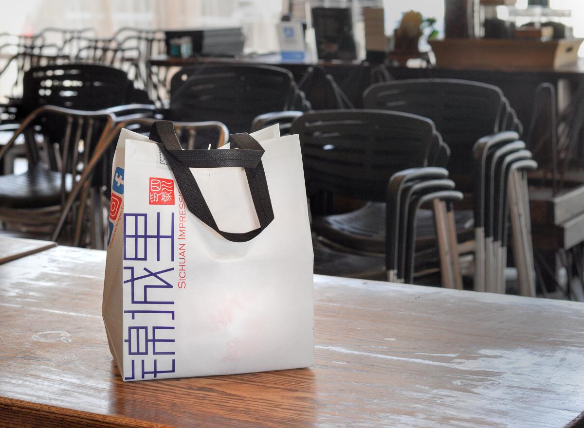 A takeout bag at Alhambra's Sichuan Impression is sealed and reusable by customers.