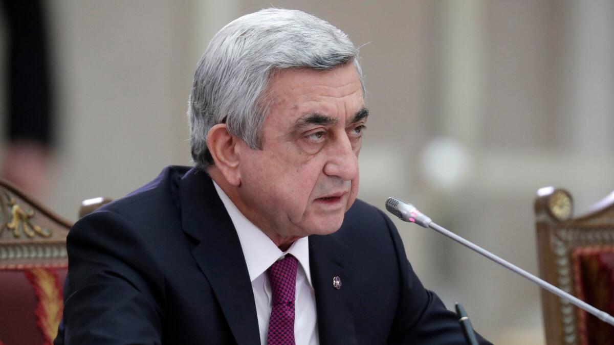 Armenian President Serzh Sargsyan attends the Supreme Eurasian Economic Council meeting in St. Petersburg, Russia on Dec. 26, 2016. Opposition demonstrators briefly seized the country's public radio to protest Sargsyan's shift into the prime minister's seat.