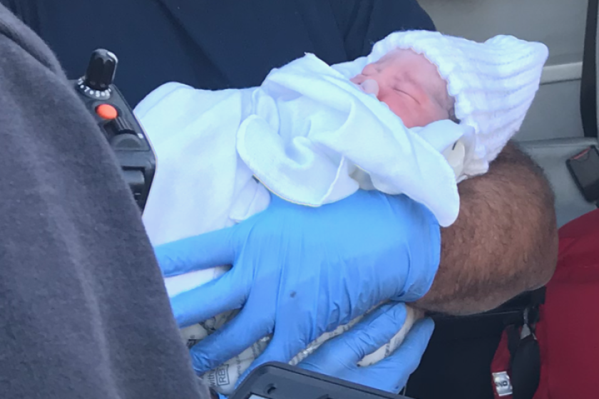Police and firefighters assisted when an infant was born in a parked pickup in Oceanside.