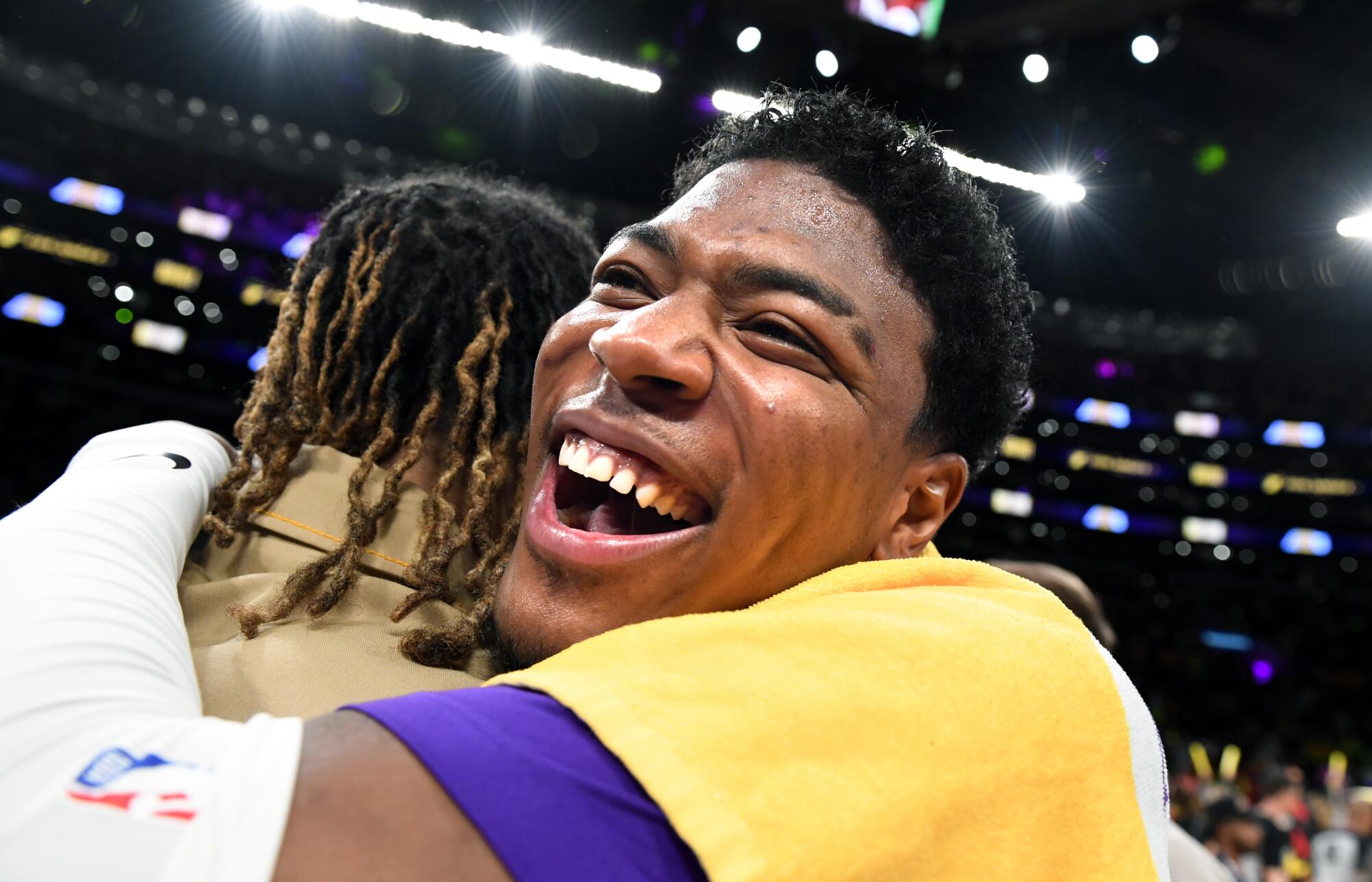 Lakers forward Rui Hachimura celebrates with teammates after beating the Memphis Grizzlies.
