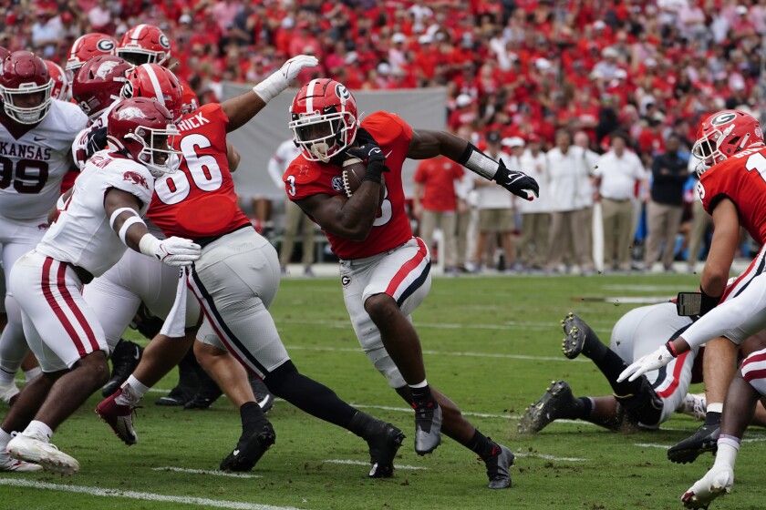 Georgia running back Zamir White scores against Arkansas.