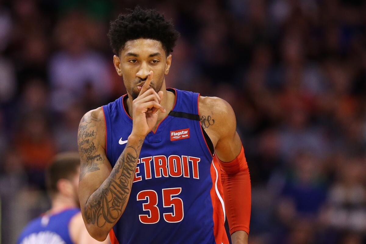 Pistons power forward Christian Wood reacts after making a three-pointer against the Suns during a game Feb. 28, 2020, in Phoenix.