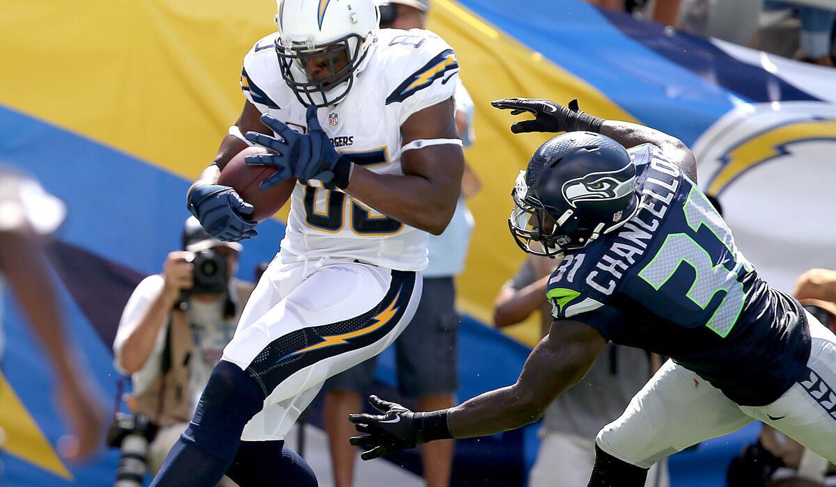 Chargers tight end Antonio Gates makes a touchdown catch in front of Seahawks strong safety Kam Chancellor in the second quarter Sunday in San Diego