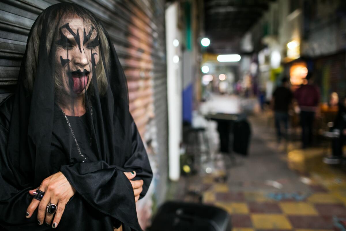 Despite the devilish costume, El Muertho got his start as a musician in church. His first album, "Padre Santo," will be released in Mexico City this week.