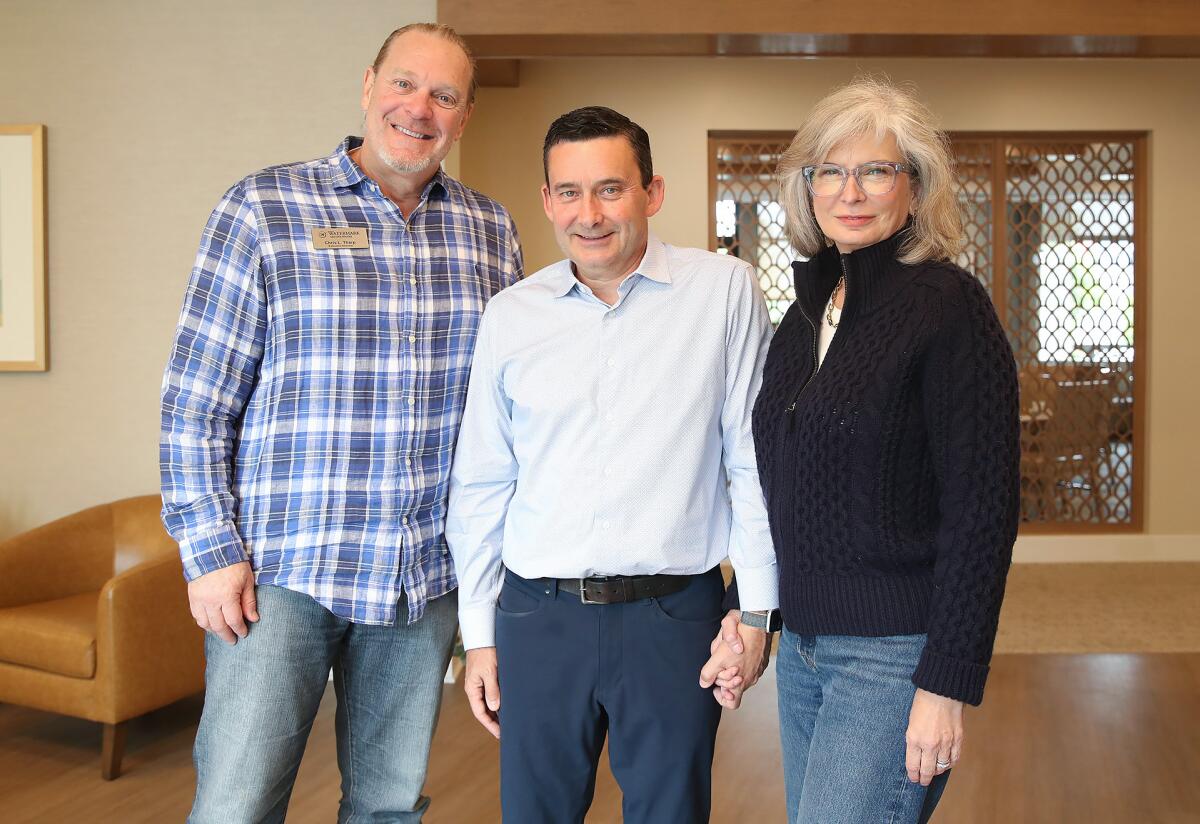 Executive Director Chris Tharp with Andrew and Laura Hollinshead, from left, at the Watermark Laguna Niguel.
