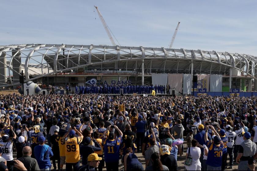 INGLEWOOD, CALIF. -- SUNDAY, JANUARY 27, 2019: Fans at the Los Angeles Rams Super Bowl Send-Off at LA Stadium in Inglewood, Calif., on Jan. 27, 2019. Rams will play the New England Patriots in Super Bowl LIII in Atlanta. (Gary Coronado / Los Angeles Times)