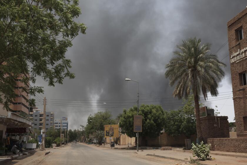 Smoke is seen rising in Khartoum, Sudan, Saturday, April 15, 2023. Fierce clashes between Sudan's military and the country's powerful paramilitary erupted in the capital and elsewhere in the African nation after weeks of escalating tensions between the two forces. (AP Photo/Marwan Ali)