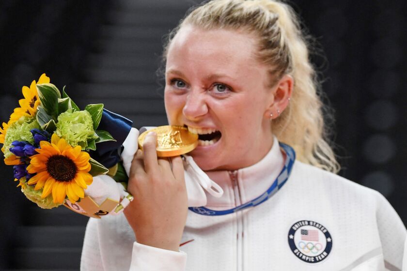 USA's Jordyn Poulter with her gold medal during the women's volleyball victory ceremony during the Tokyo 2020 Olympic Games at Ariake Arena in Tokyo on August 8, 2021. (Photo by Yuri Cortez / AFP) (Photo by YURI CORTEZ/AFP via Getty Images)