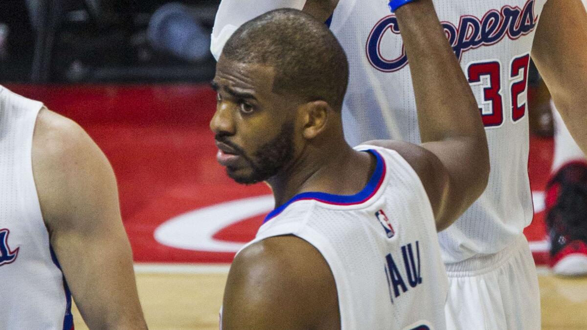 Clippers point guard Chris Paul looks on during a win over the San Antonio Spurs in Game 7 of the Western Conference quarterfinals at Staples Center on Saturday.