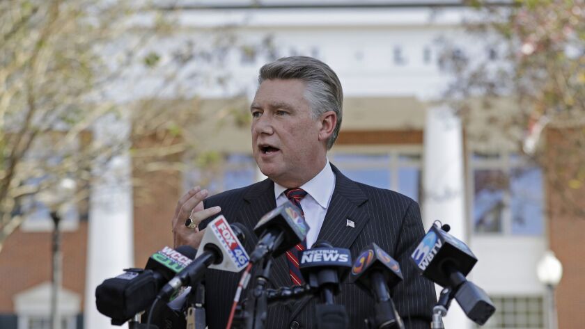 Republican candidate Mark Harris speaks to the media during a news conference Nov. 7 in Matthews, N.C.