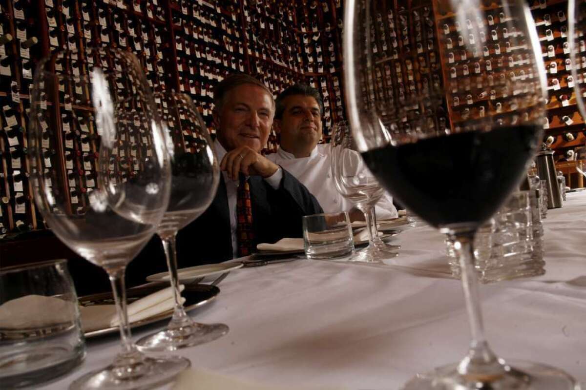 Owner Piero Selvaggio, left, and chef Nicolo Chessa in the wine cellar at Valentino restaurant in Santa Monica.