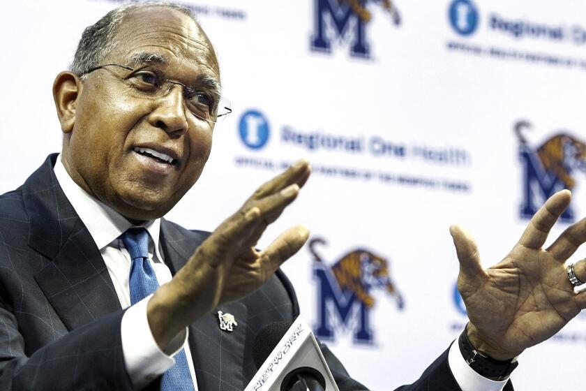 Tubby Smith answers a question during his introductory news conference Thursday at Memphis.