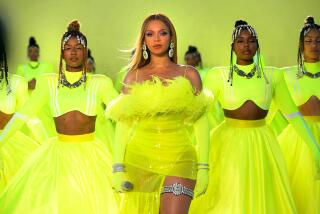 A row of women wearing lime green dresses against a lime green background