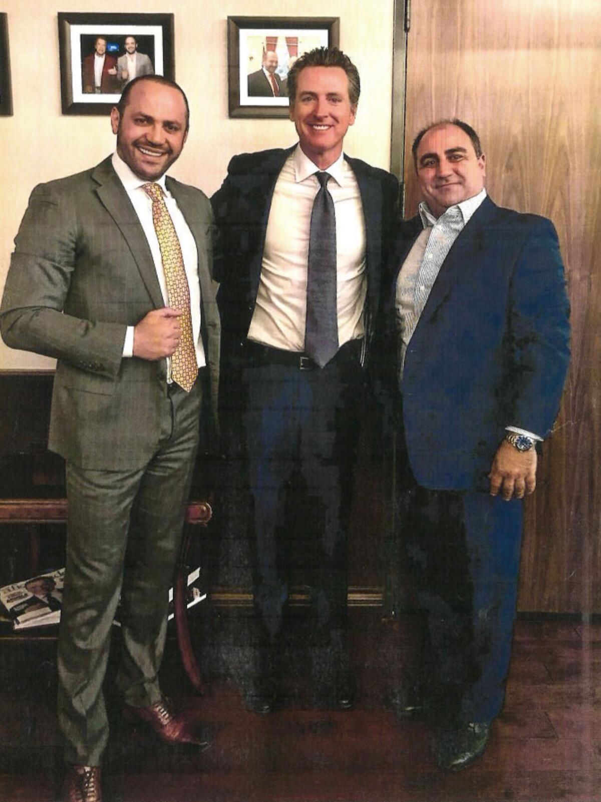  Edgar Sargsyan and John Balian posing with Gavin Newsom 
