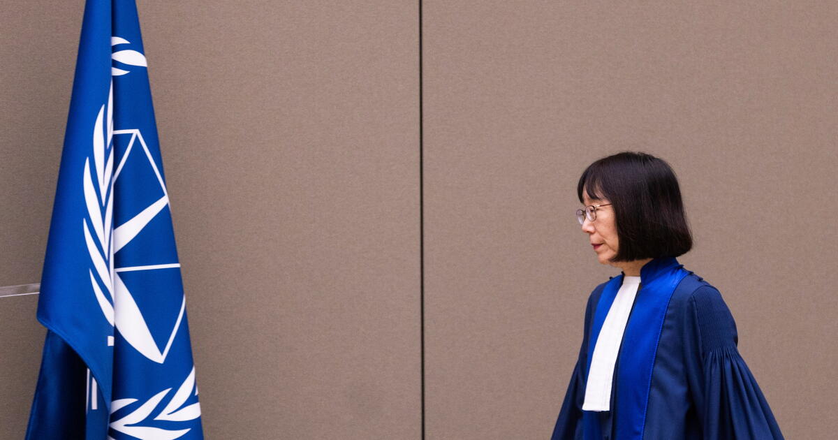 Photo: latimes.com FILE - Judge Tomoko Akane walks before delivering the verdict in the Al Hassan case at the International Criminal Court in