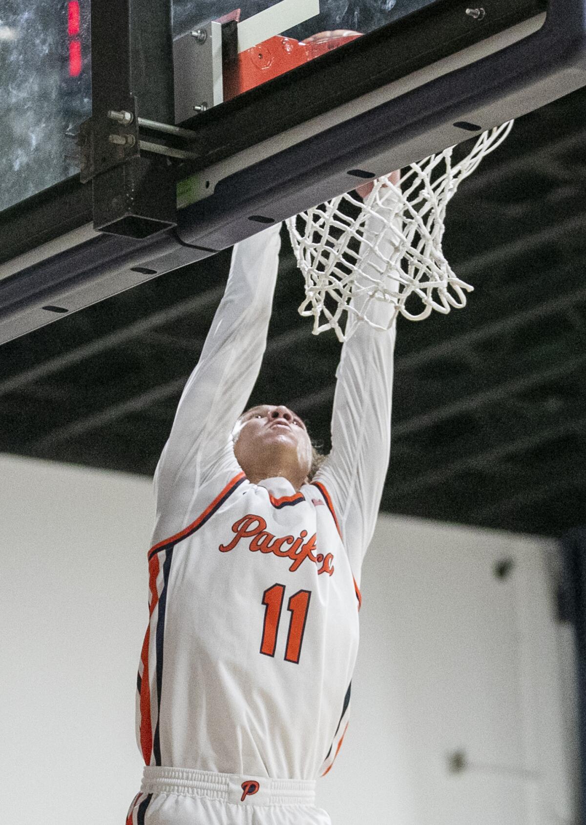 Pacifica Christian's Logan Stewart dunks on a fastbreak against King-Drew on Thursday.