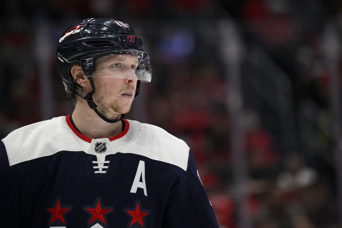 Washington Capitals center Nicklas Backstrom (19) looks on during the second period of an NHL hockey game against the New York Islanders, Tuesday, April 26, 2022, in Washington. (AP Photo/Nick Wass)