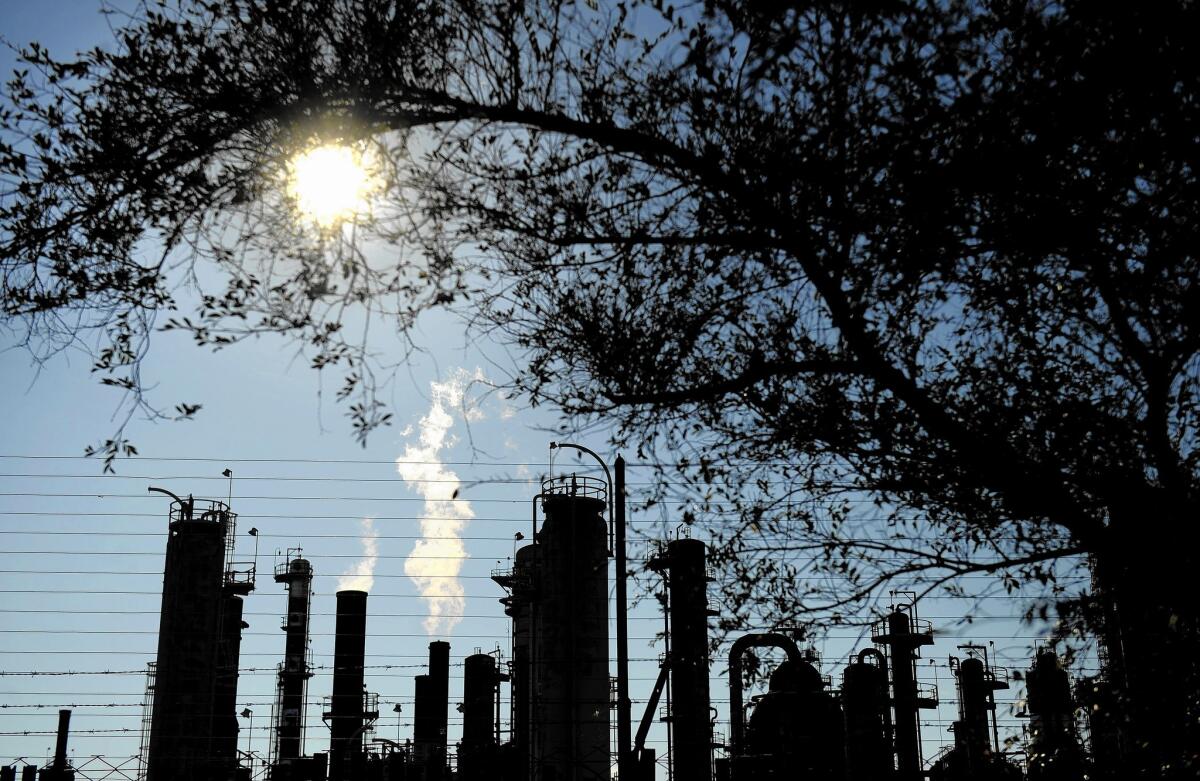 The state Air Resources Board is expected to add several provisions to its low-carbon fuel program. Above, the Exxon Mobil refinery in Torrance.