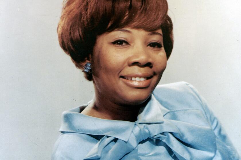Photo of American singer Mabel John posed in 1966. 