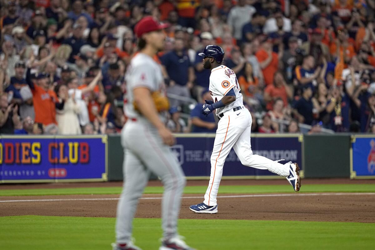 Houston's Yordan Alvarez runs the bases after hitting a two-run home run off Angels pitcher Michael Lorenzen.