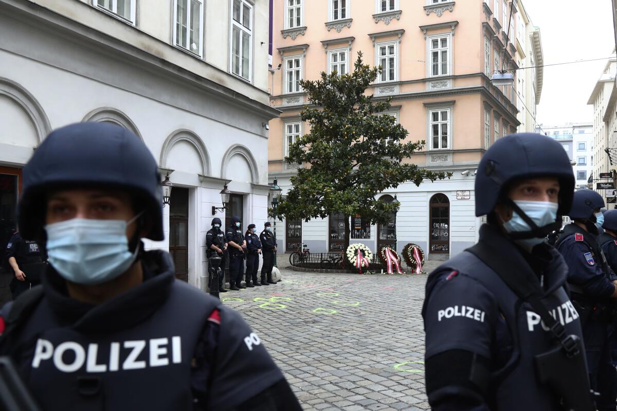 Police officers in Vienna on Tuesday, the morning after a terrorist attack that killed five people.