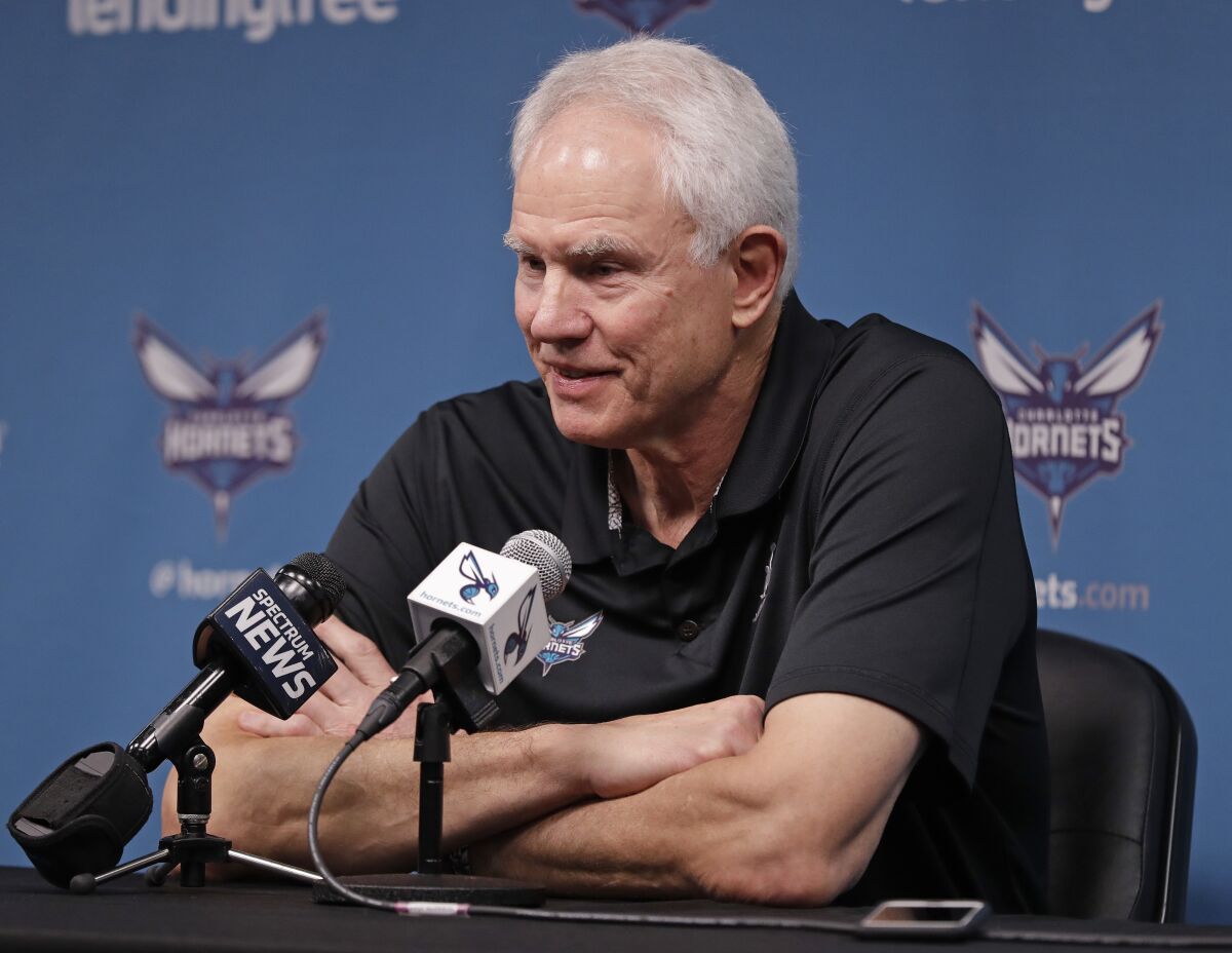 FILE - Charlotte Hornets general manager Mitch Kupchak speaks to the media during a news conference for the NBA basketball team in Charlotte, N.C., Friday, April 12, 2019. Kupchak has signed a multi-year contract extension to remain on as the Charlotte Hornets general manager. Kupchak’s contract was set to expire this summer. Kupchak told reporters on Thursday, May 19, 2022, that “for better or for worse I will be here for the next couple of years.” (AP Photo/Chuck Burton, File)