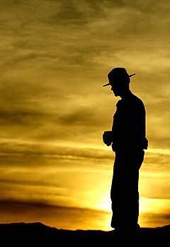 Park ranger Bill Reynolds looks over the dunes at Death Valley National Park.