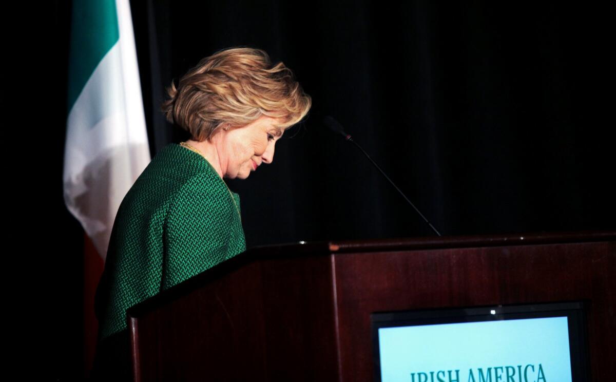Former Secretary of State Hillary Clinton finishes speaking on stage during a ceremony to induct her into the Irish America Hall of Fame on March 16, 2015 in New York City.