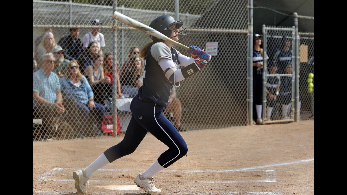 Newport Harbor's Eliana Gottlieb hits a two-run homer against Ocean View in the first inning of a CIF Southern Section Division 5 first-round playoff game at home on May 2, 2019.
