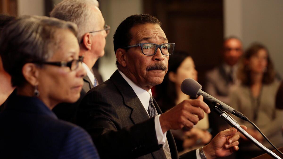 L.A. City Council President Herb Wesson, pictured at a news conference last year, is calling for new measures to crack down on misbehavior by visitors to City Hall.