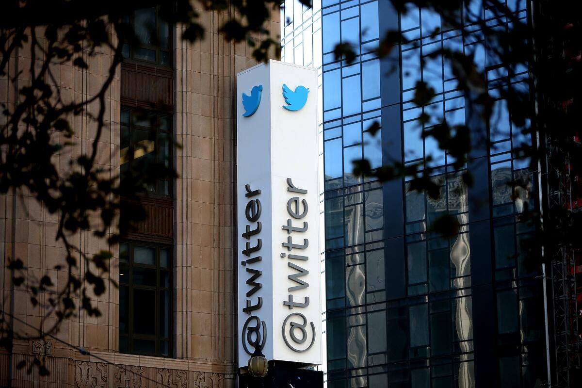 A sign is posted outside of the Twitter headquarters in San Francisco.