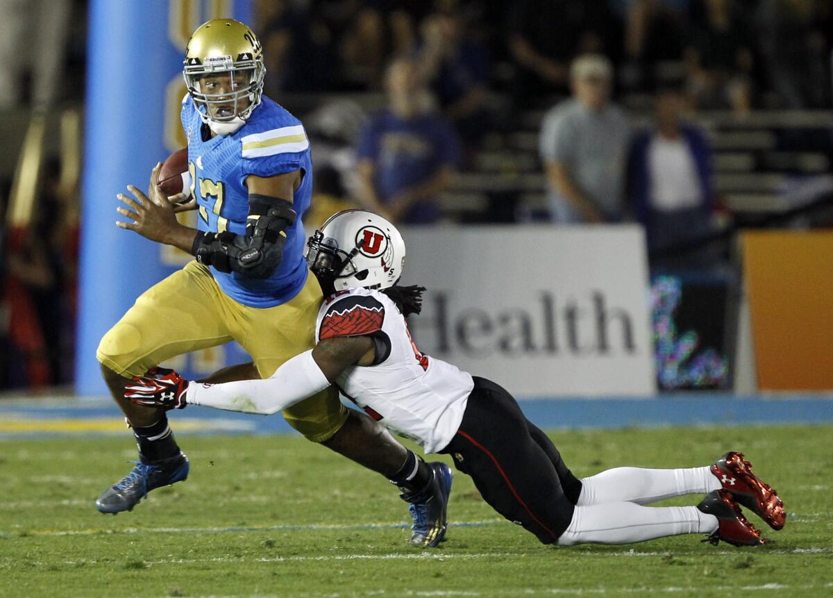 Utah defensive back Justin Thomas sacks UCLA quarterback Brett Hundley in 2014