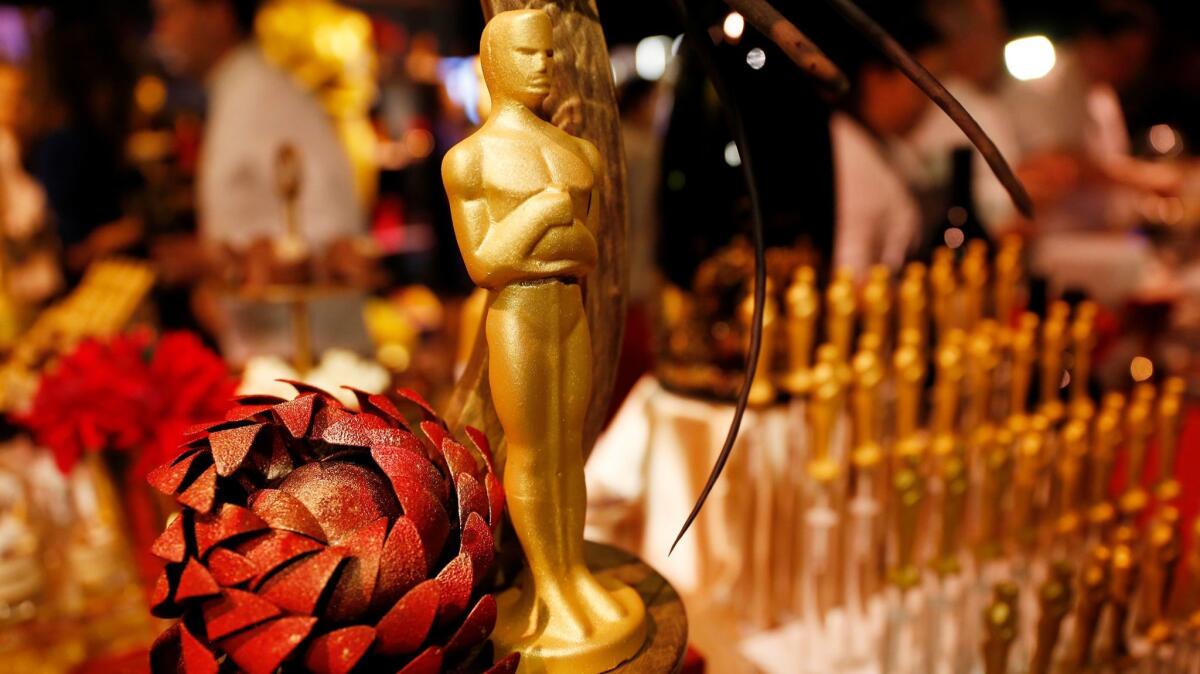 A variety of chocolate Oscar statuettes by chef Wolfgang Puck for the 89th Oscars Governors Ball press preview.