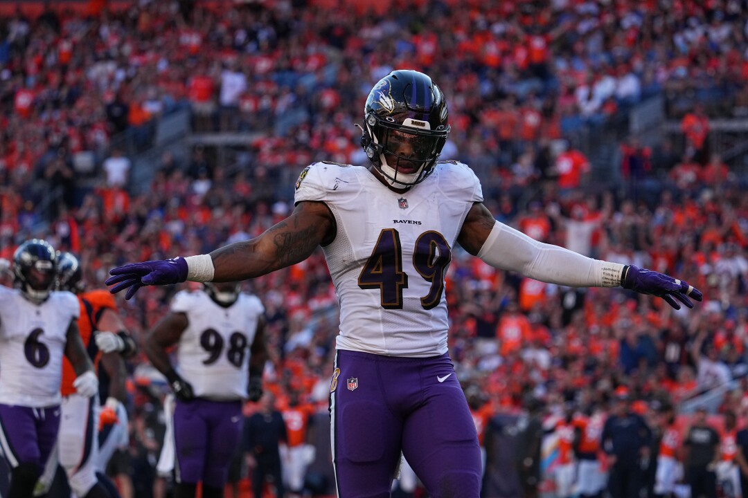 Baltimore Ravens linebacker Chris Board celebrates a play.