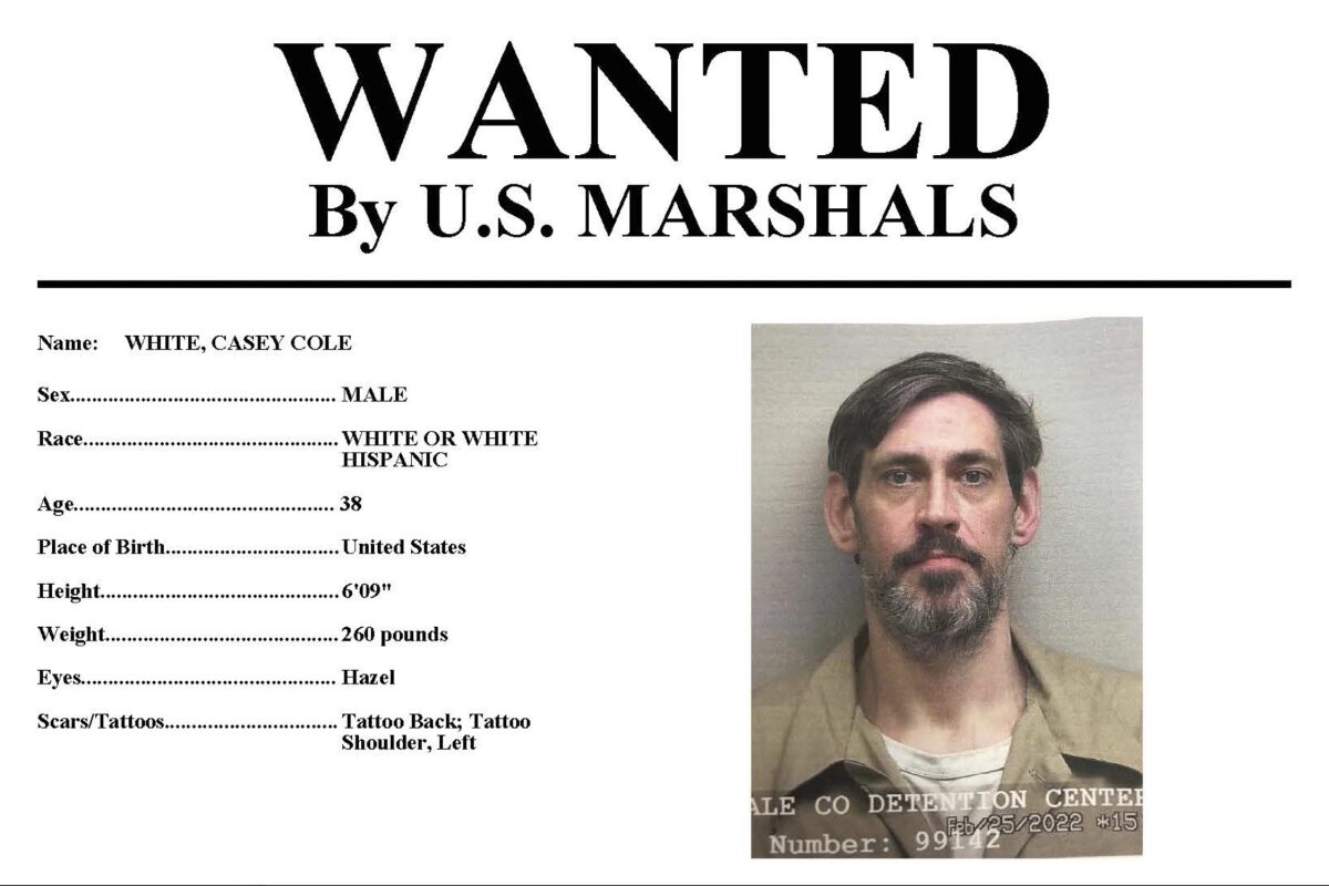 This image provided by the U.S. Marshals Service on Sunday, May 1, 2022 shows part of a wanted poster for Casey Cole White. On Sunday, the U.S. Marshals announced it is offering up to $10,000 for information about escaped inmate Casey Cole White, 38, and a “missing and endangered” correctional officer, Vicky White, 56, who disappeared Friday after they left the Lauderdale County Detention Center in Florence, Ala. (U.S. Marshals Service via AP)