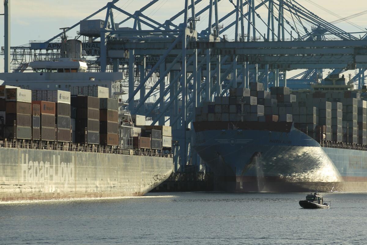 The longshoremen's union is negotiating a new contract for dockworkers at 29 West Coast ports. Above, a container ship docked at the Port of Los Angeles in April.