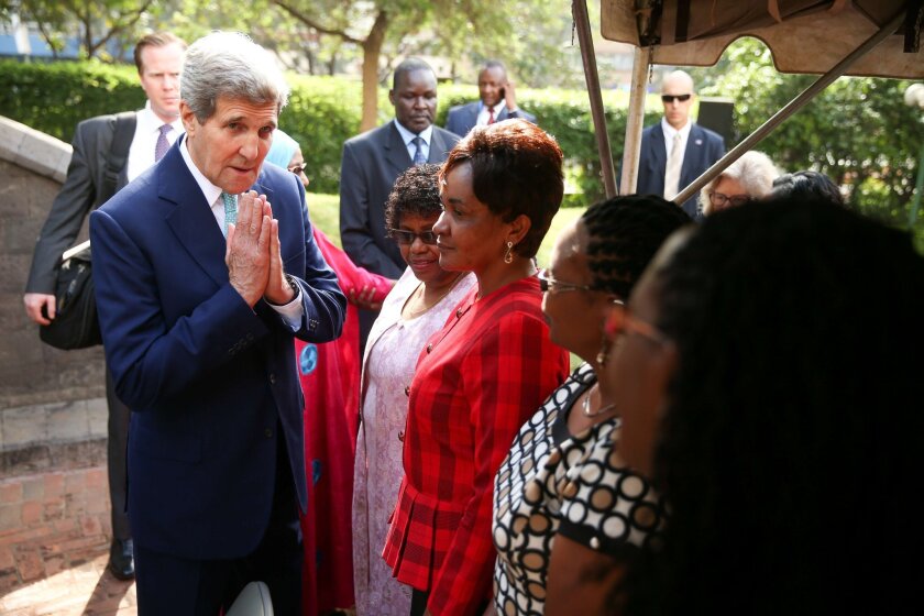 Secretary of State John F. Kerry greets victims and the families of victims of the 1998 bombing of the U.S. Embassy in Kenya during a wreath-laying ceremony at a memorial in Nairobi on May 4.