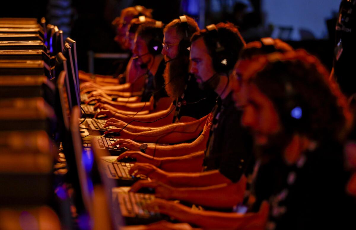 Game players try out new games and features at at BlizzCon on Friday.