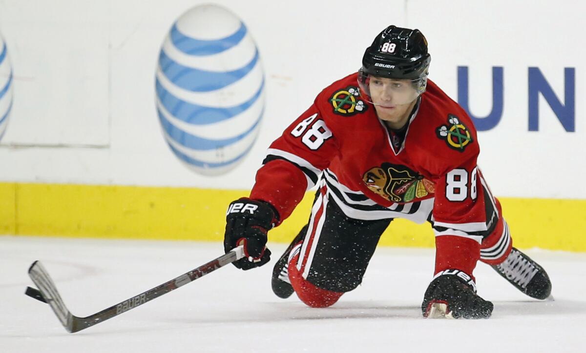 Chicago Blackhawks right wing Patrick Kane skates with the puck in