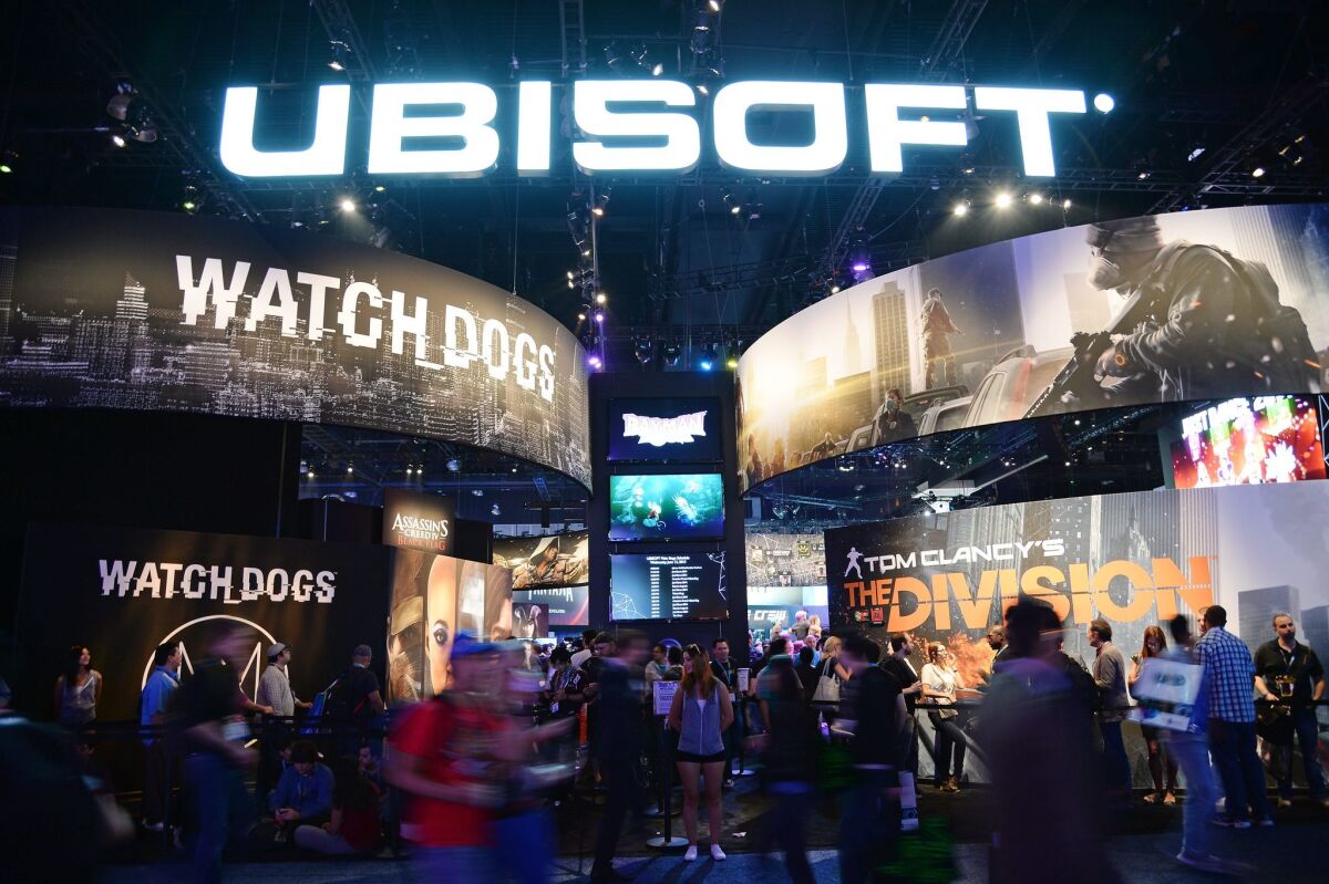 The Ubisoft display at the Electronic Entertainment Expo (E3) in Los Angeles on June 12. The video game "Watch Dogs" by Ubisoft, whose protagonist controls the world around him by hacking into computer systems, is generating growing buzz for its eerie parallels with the current storm about US surveillance of private citizens.