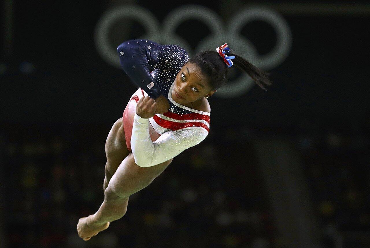 Simone Biles of USA competes on the vault during the women's Artistic Gymnastics team final.