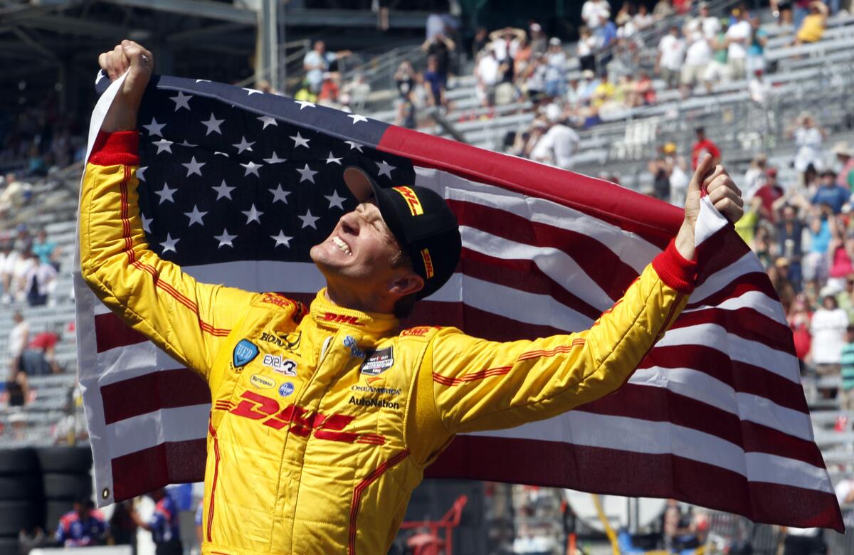 Ryan Hunter-Reay, who called himself 'a proud American boy,' celebrates after winning the 98th running of the Indianapolis 500 on Sunday. He was the first American to win the race since 2006.