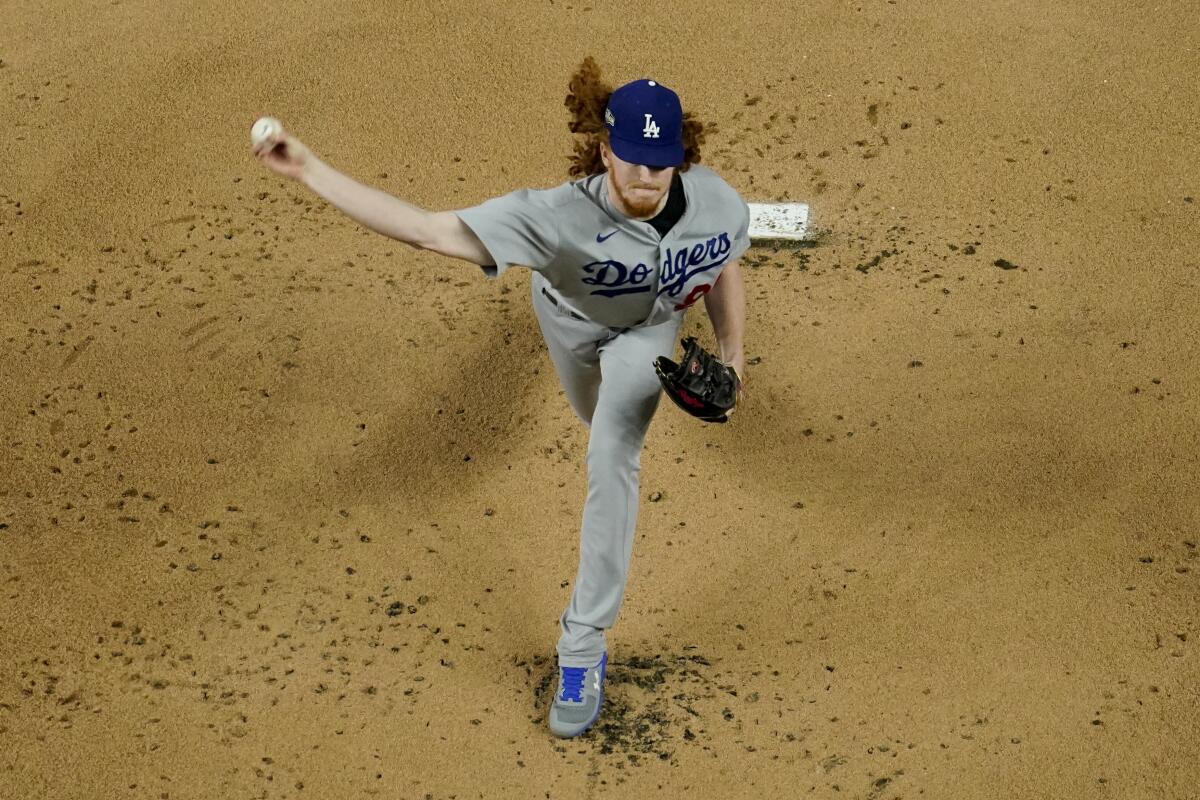 Dodgers starter Dustin May delivers in the first inning of Game 5 of the NLCS.