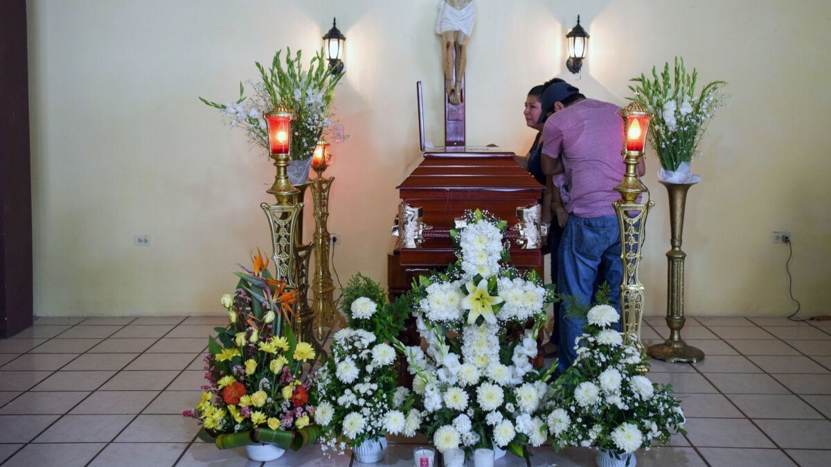 Relatives of mourn slain Mexican journalist Leobardo Vazquez Atzin during his funeral in Papantla, Veracruz state, on March 22, 2018.