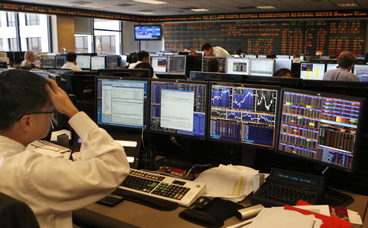 The bond trading room at PIMCO, photographed March 18, 2010, is a global investment management firm in Newport Beach, CA.